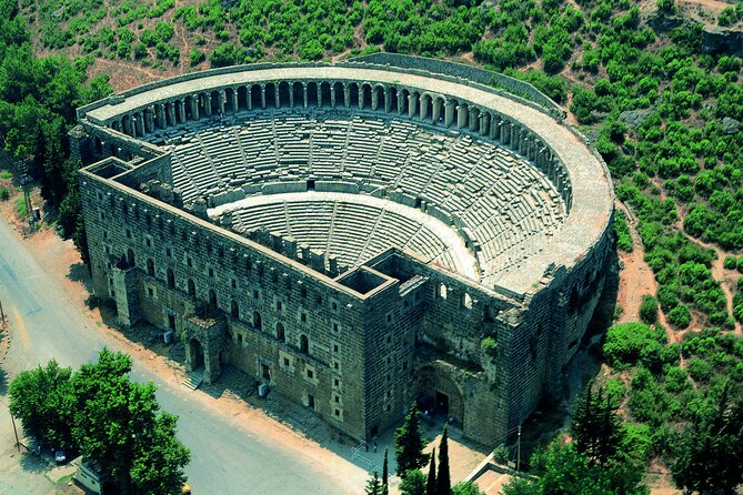 Antalya Tour To Perge Aspendos And Side With Manavgat Waterfall - Perge: Theatre, Gladiators, Walls, and Bronze-Age Echoes