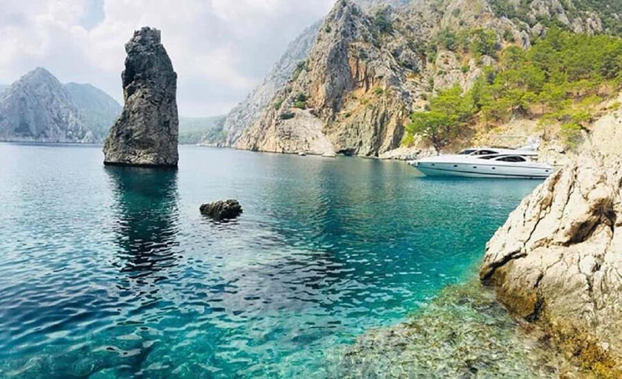 Kemer Porto Genoese-Sazak Bays Boat Trip With Mud Baths - Lunch on the boat: BBQ meal, drinks reality, and what to bring