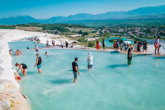 Pamukkale Full Day Guided Shared Tour with Lunch from Antalya - Hotel pickup, air-conditioned bus, and what the guide adds